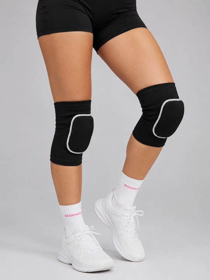BodiModi knee pads for volleyball worn on legs, studio product shot